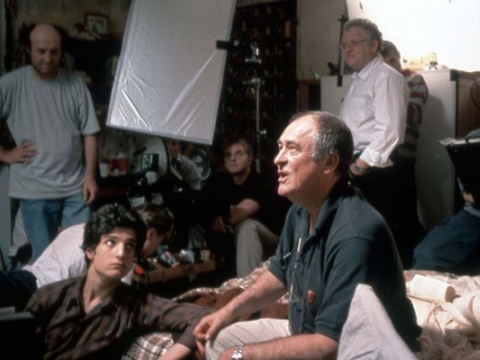 Bernardo Bertolucci filmuojant „Svajotojus“