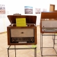 Kauno radijo gamykloje pagamintos radiolos ir magnetolos, pirmoji iÅ¡ kairÄ—s â€“ radiola â€žDainaâ€œ. 1958 m. A. NaruÅ¡ytÄ—s nuotr.
