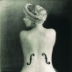 Man Ray, „Le Violon d’Ingres“, 1924 m. Perspausdinta 1976. Archivio Storico della Biennale di Venezia nuosvybė - ASAC, Venecija © Man Ray Trust by SIAE 2023 
